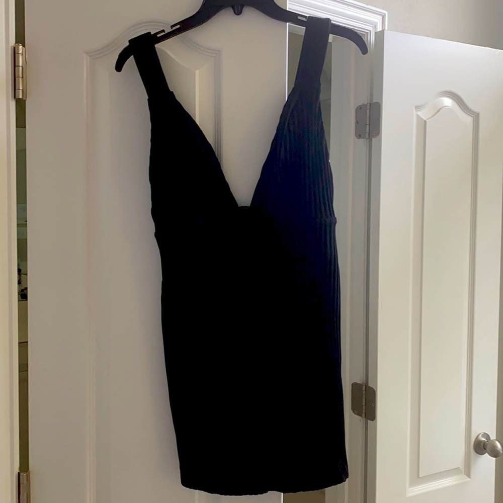 Short sexy black dress. Never worn.